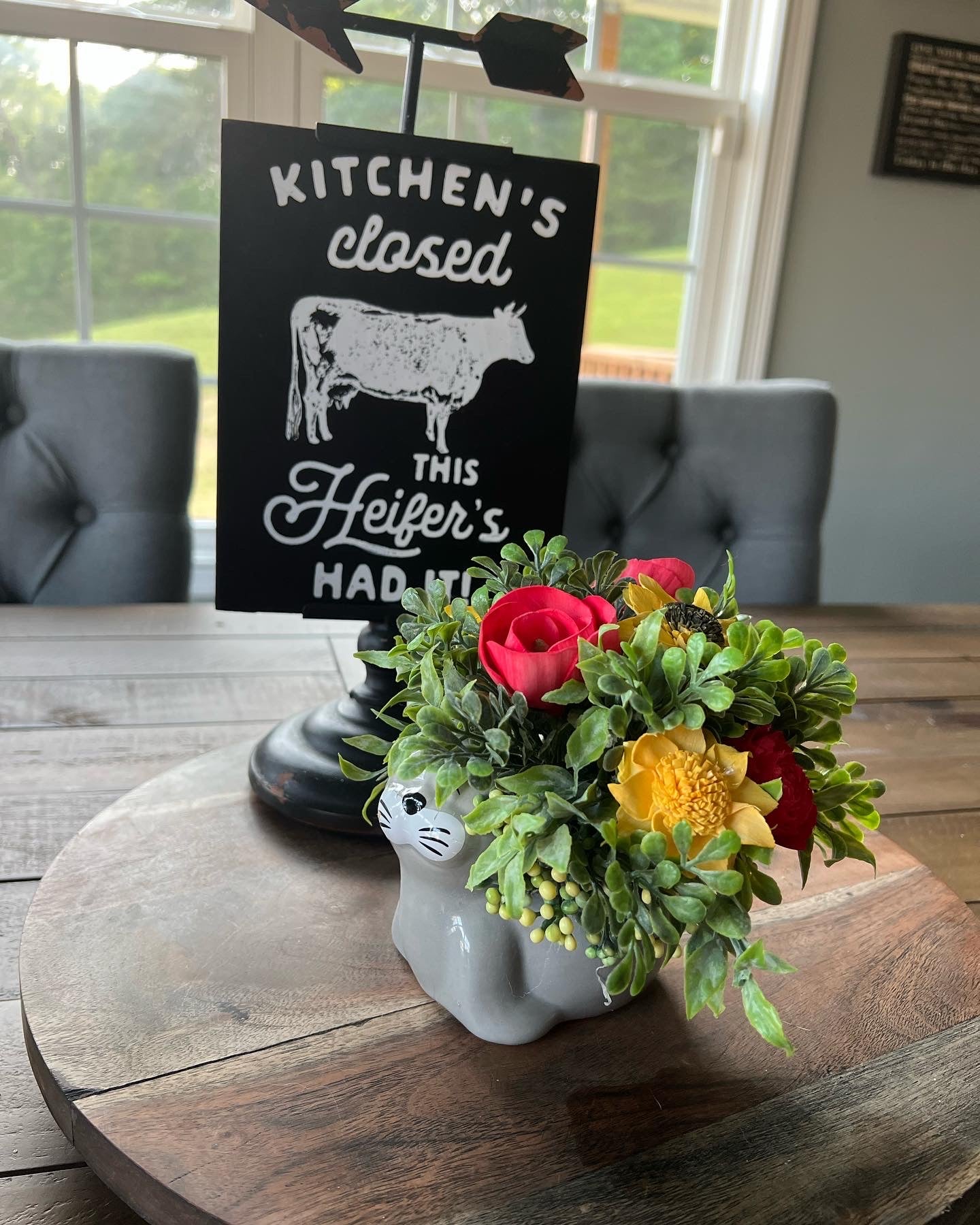 Sea Lion with red and yellow flowers