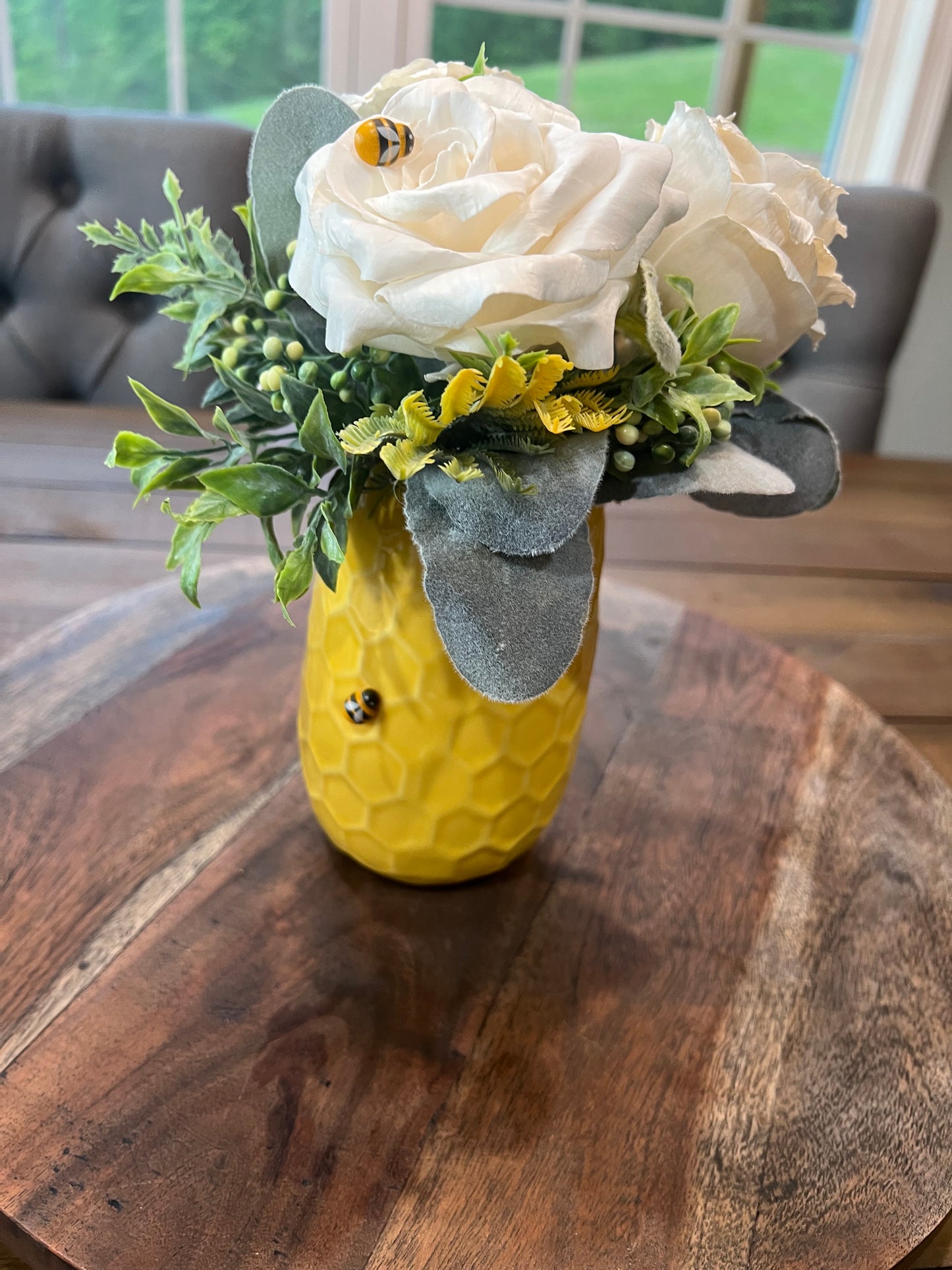 YELLOW VASE WITH WHITE ROSES ARRANGEMENT