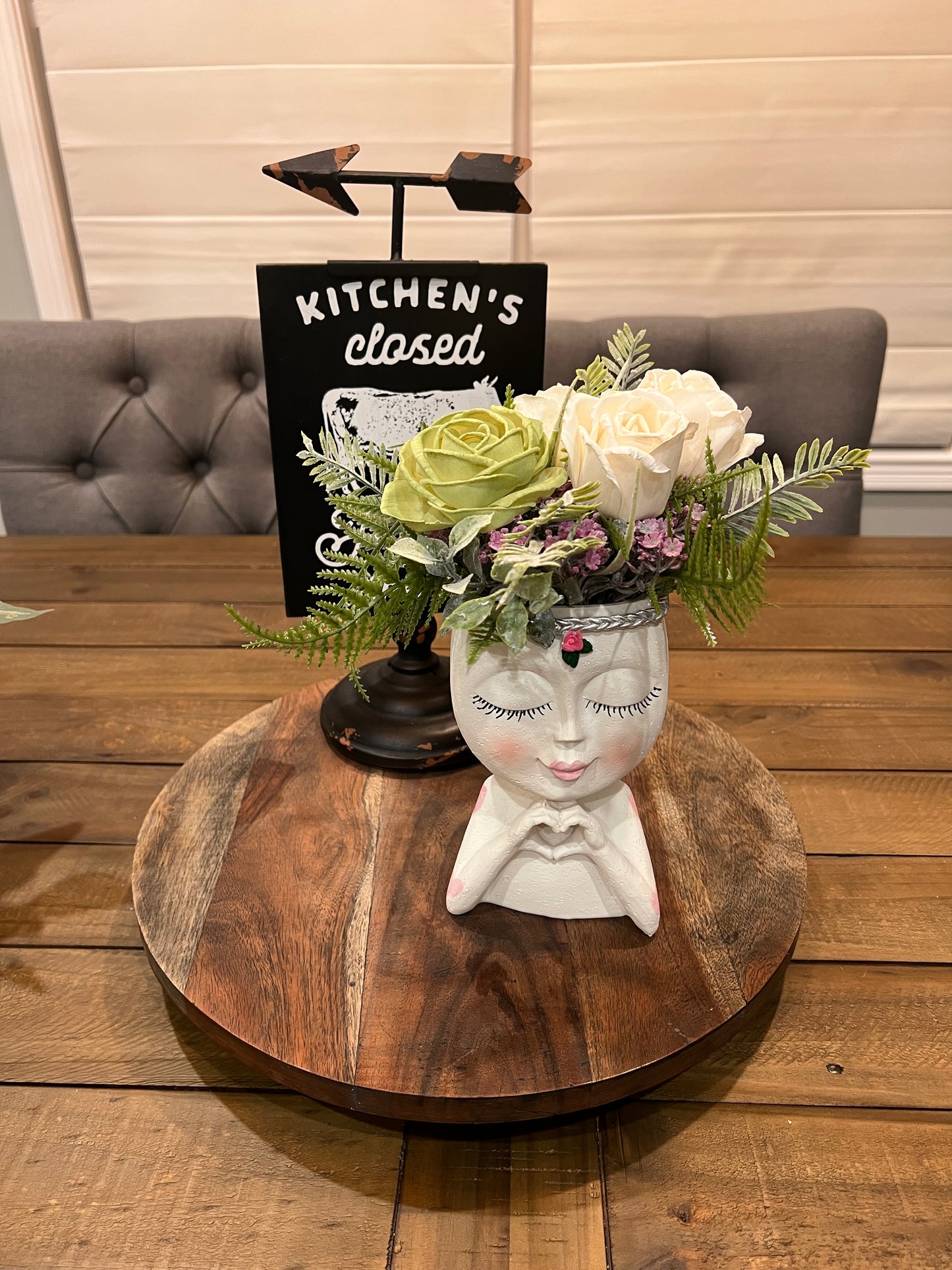 Head with Green and White flowers