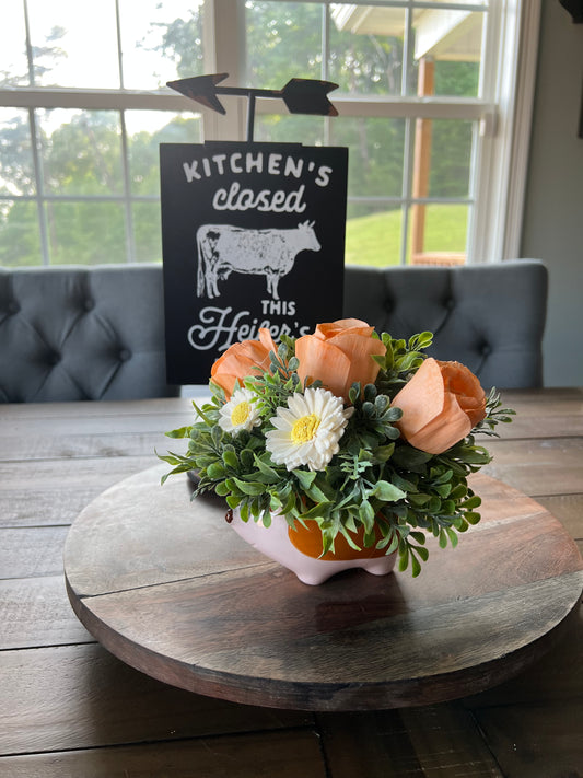 Hedgehog with orange roses and daisy wood flowers