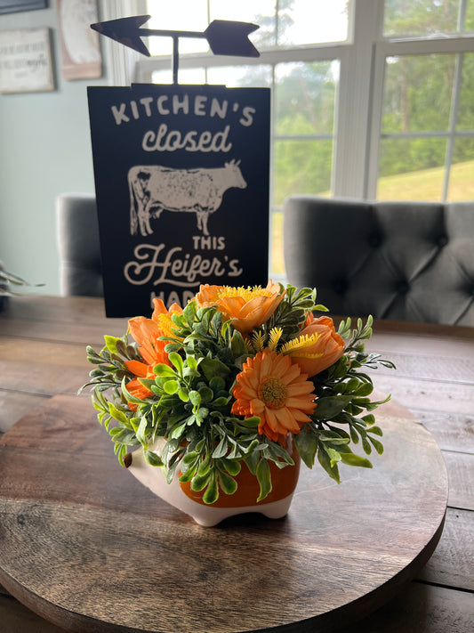 Hedgehog with orange flowers