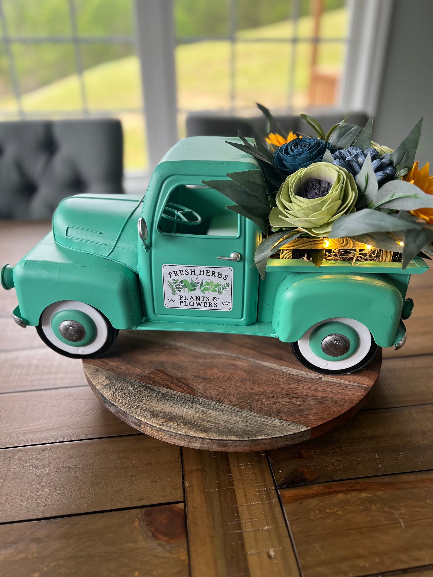 TEAL TRUCK FLORAL ARRANGEMENT WITH WORKING LIGHT
