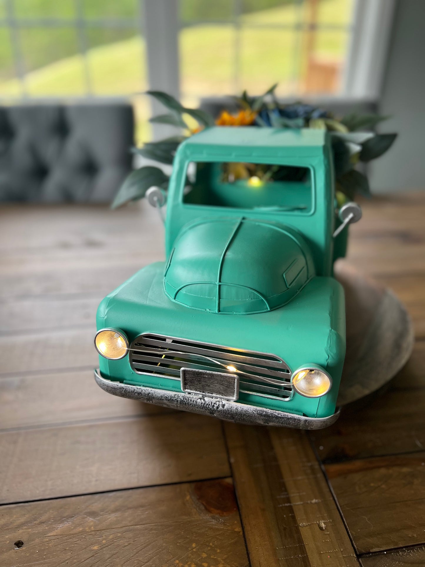 TEAL TRUCK FLORAL ARRANGEMENT WITH WORKING LIGHT